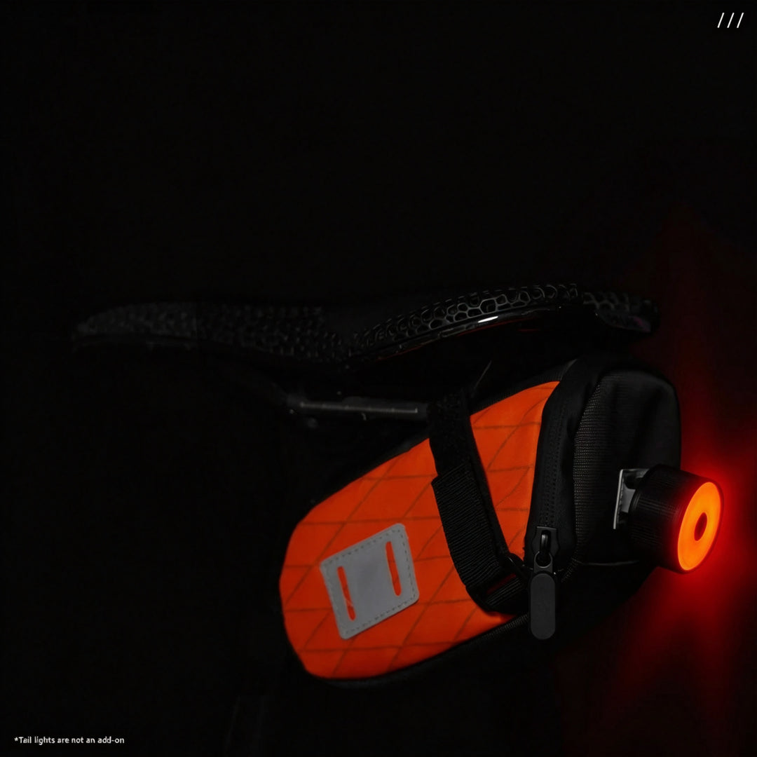 ENLEE orange bicycle seat bag with rear tail light mount for night riding safety.