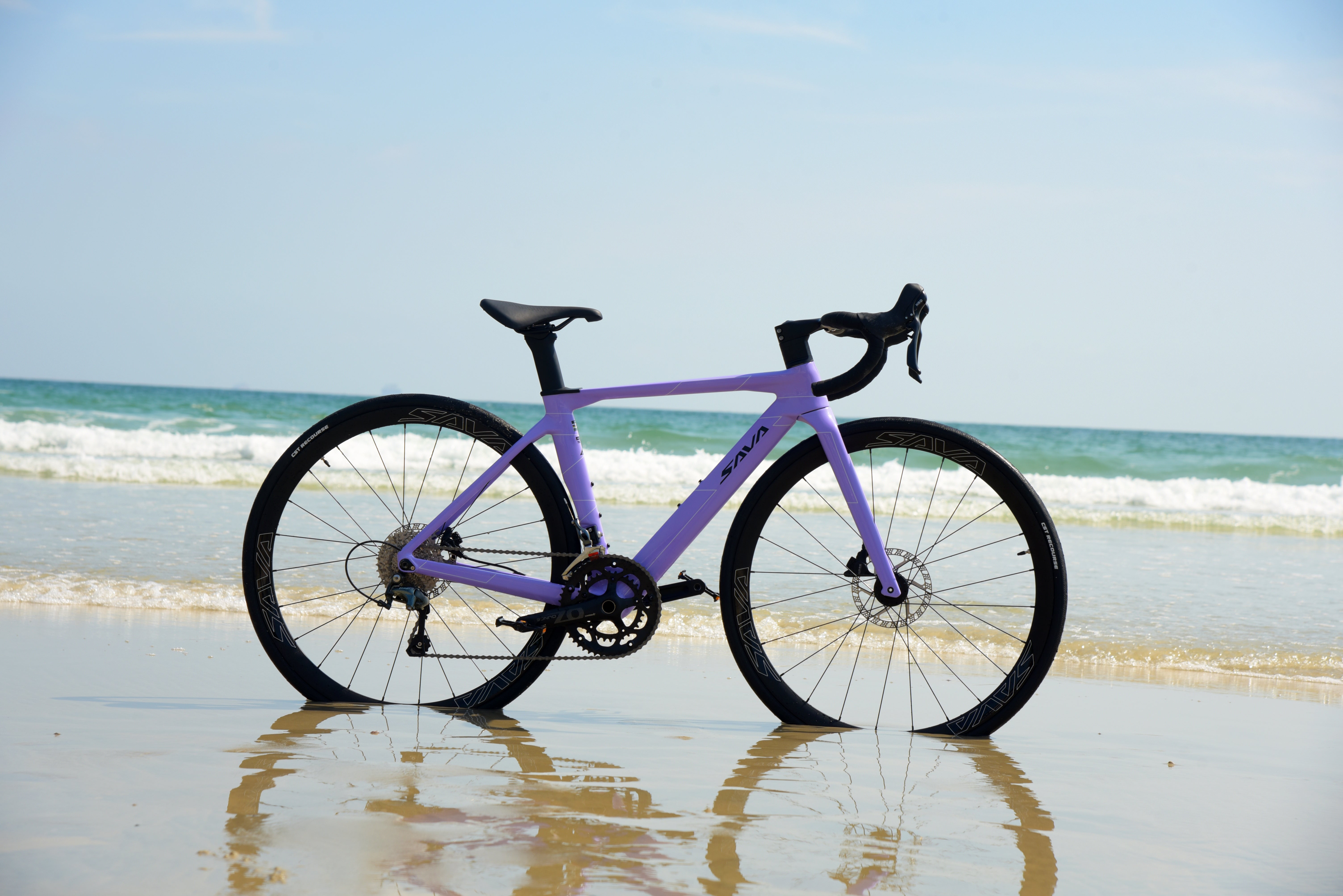 A4 carbon fiber road bike beach real shot-purple