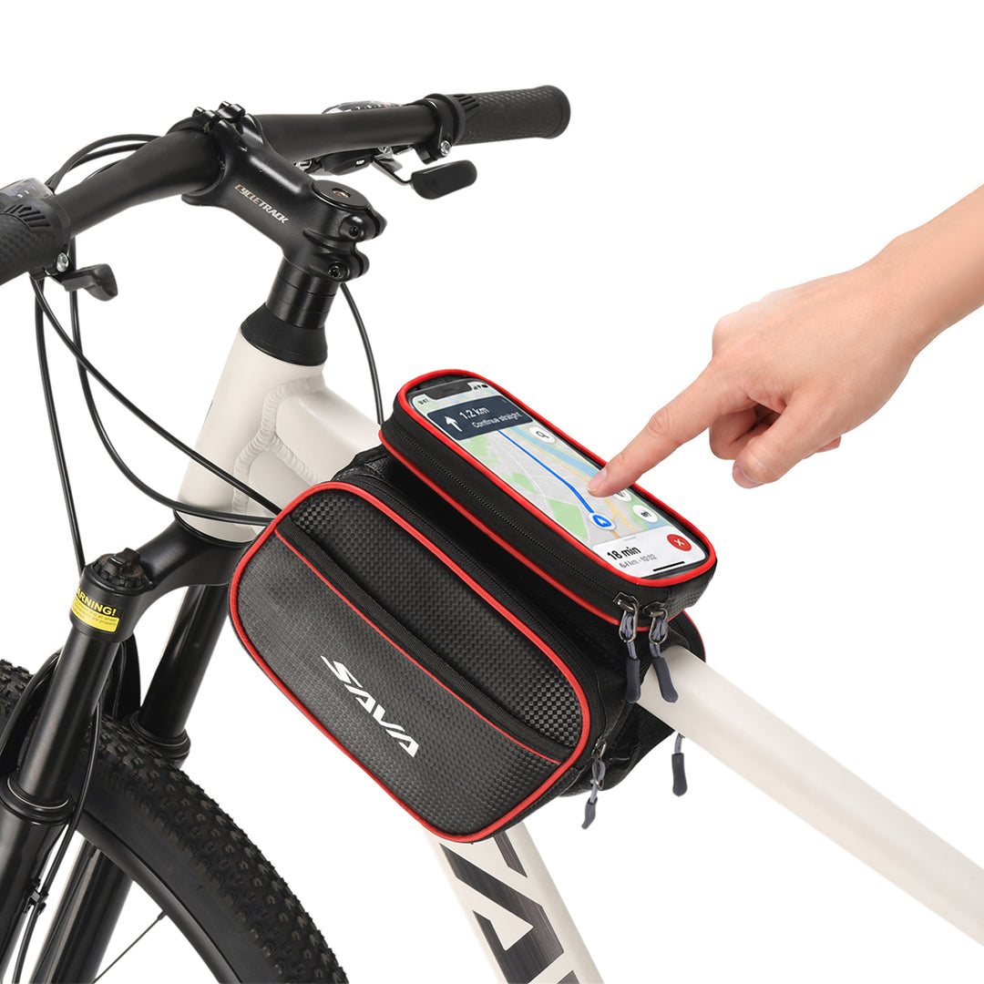 Cyclist touching phone screen through waterproof bike frame bag